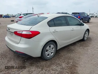 2015 Kia Forte LX with VIN KNAFK4A66F5314811, listed as a IAAI auction lot 42054640 with 123,901 mi miles. Bid and sale history available at carsss.com. Image 4.