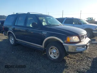 1997 Ford Expedition XLT z VIN 1FMFU18LXVLB22952, wystawiony jako IAAI lot #41706527 z przebiegiem 282 860 mil mil oraz . Historia ofert i sprzedaży dostępna na DreamBid. Obrazek 1.