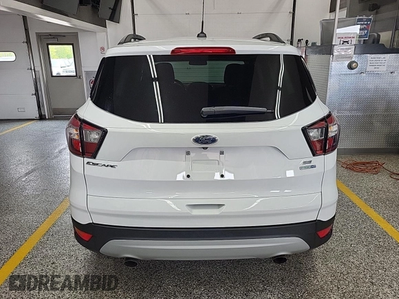 2018 Ford Escape SE z VIN 1FMCU9GD3JUC89119, wystawiony jako IAAI lot #42421139 z przebiegiem 42 209 mil mil oraz . Historia ofert i sprzedaży dostępna na DreamBid. Obrazek 20.