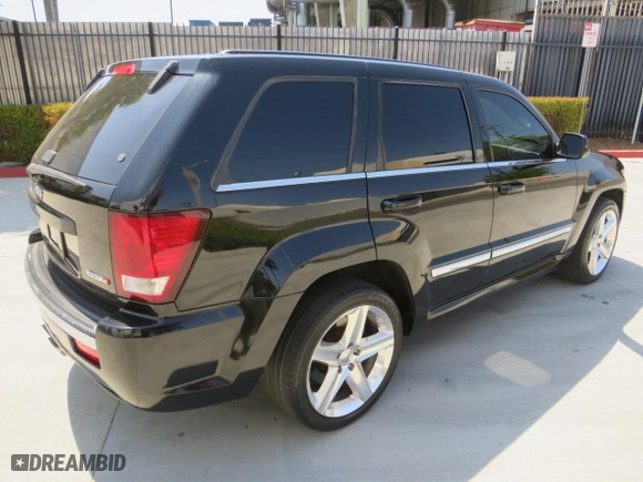 2007 Jeep Grand Cherokee SRT-8 with VIN 1J8HR78347C515195, listed as a Copart auction lot 77478044 with 126,330 mi miles and Salvage Title. Bid and sale history available at carsss.com. Image 3.