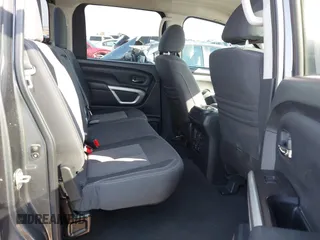 2021 Nissan Titan SV with VIN 1N6AA1EF2MN504611, listed as a IAAI auction lot 41469990 with 81,432 mi miles and . Bid and sale history available at DreamBid. Image 8.