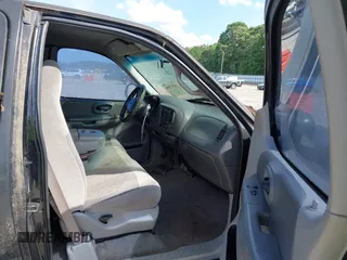 1999 Ford F-150 XL with VIN 1FTRX17L0XNA01154, listed as a IAAI auction lot 42417690 with 334,508 mi miles and . Bid and sale history available at DreamBid. Image 5.