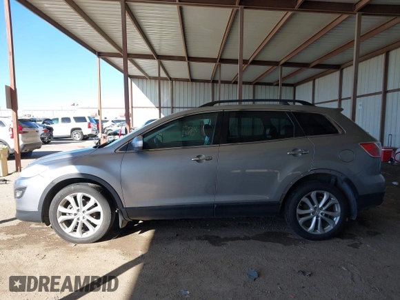 2011 Mazda CX-9 Grand Touring с VIN JM3TB3DA9B0317149, выставлен на аукционе IAAI как лот 41720503 с пробегом 199 539 миль миль и . История ставок и продаж доступна на DreamBid. Изображение 15.