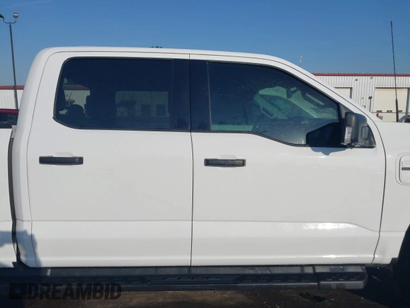 2023 Ford F-150 Lightning Pro with VIN 1FTVW1EL6PWG34059, listed as a IAAI auction lot 42010900 with 20,759 mi miles and . Bid and sale history available at DreamBid. Image 13.
