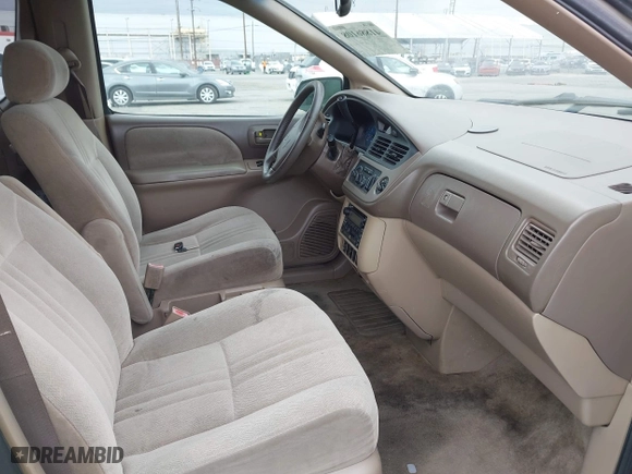 2003 Toyota Sienna LE with VIN 4T3ZF13C03U534780, listed as a IAAI auction lot 41886108 with 191,791 mi miles. Bid and sale history available at carsss.com. Image 5.
