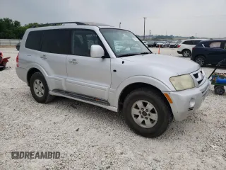 2003 Mitsubishi Montero LTD with VIN JA4NW51S53J043646, listed as a Copart auction lot 57050704 with 214,720 mi miles and Clean Title. Bid and sale history available at carsss.com. Image 4.