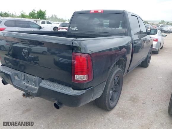2014 Ram 1500 Tradesman with VIN 1C6RR6KTXES237296, listed as a IAAI auction lot 41950682 with 202,757 mi miles. Bid and sale history available at carsss.com. Image 4.