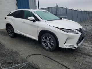 2020 Lexus RX with VIN 2T2JZMDA8LC249382, listed as a Copart auction lot 51834815 with 60,470 mi miles and Clean Title. Bid and sale history available at carsss.com. Image 4.