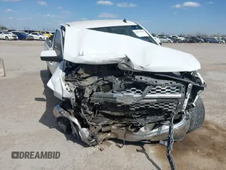 2014 Chevrolet Silverado 1500 LT with VIN 1GCRCREC9EZ338909, listed as a IAAI auction lot 41833908 with Not Provided miles and . Bid and sale history available at DreamBid. Image 6.