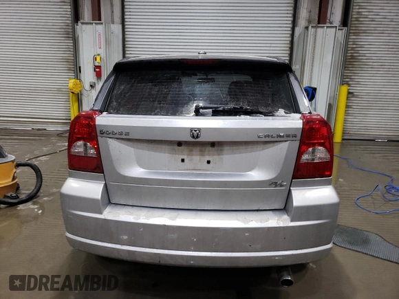 2009 Dodge Caliber R/T z VIN 1B3HB78B79D168527, wystawiony jako Copart lot #43616005 z przebiegiem 168 694 mil mil oraz Szkoda całkowita • Salvage title. Historia ofert i sprzedaży dostępna na DreamBid. Obrazek 6.