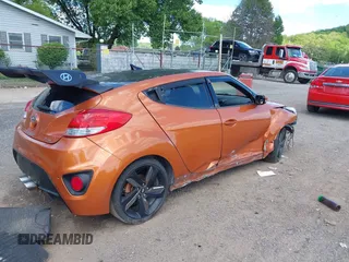 2013 Hyundai Veloster Turbo z VIN KMHTC6AE1DU101236, wystawiony jako IAAI lot #42230984 z przebiegiem 131 854 mil mil oraz . Historia ofert i sprzedaży dostępna na DreamBid. Obrazek 4.