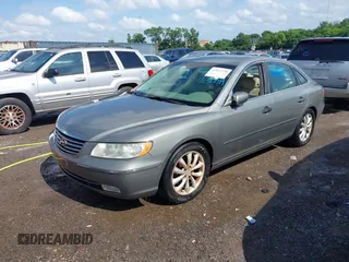 2006 Hyundai Azera SE with VIN KMHFC46F36A048952, listed as a IAAI auction lot 42522719 with 144,155 mi miles and . Bid and sale history available at DreamBid. Image 2.