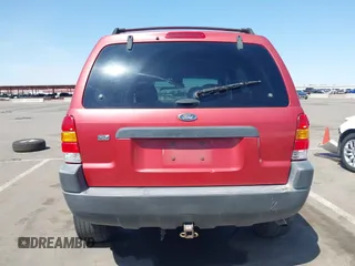 2003 Ford Escape XLT Popular 2 with VIN 1FMYU93123KB02310, listed as a IAAI auction lot 41975073 with 169,864 mi miles. Bid and sale history available at carsss.com. Image 16.