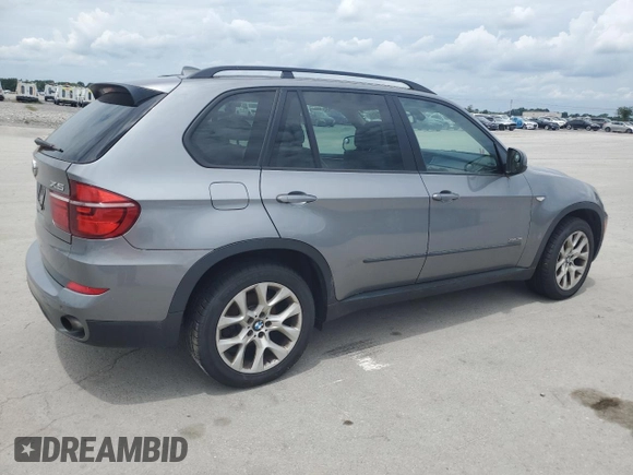 2012 BMW X5 35i with VIN 5UXZV4C59CL991689, listed as a Copart auction lot 64022615 with 208,620 mi miles and Salvage title. Bid and sale history available at DreamBid. Image 3.