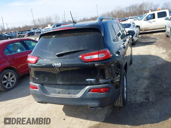 2015 Jeep Cherokee North with VIN 1C4PJMCS4FW792918, listed as a IAAI auction lot 41748651 with 107,034 mi miles. Bid and sale history available at carsss.com. Image 17.