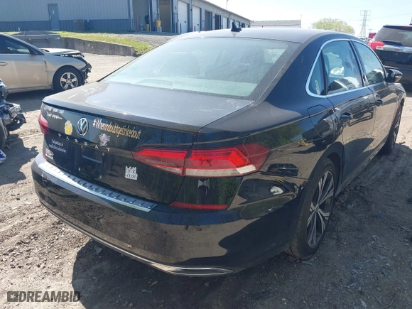 2021 Volkswagen Passat 2.0T SE with VIN 1VWSA7A32MC015219, listed as a IAAI auction lot 39240566 with 68,095 mi miles. Bid and sale history available at carsss.com. Image 4.