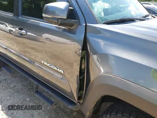 2023 Toyota Tacoma SR with VIN 3TMCZ5AN9PM553246, listed as a IAAI auction lot 42201812 with 20,907 mi miles and . Bid and sale history available at DreamBid. Image 18.