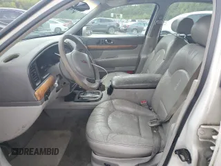 1998 Lincoln Continental with VIN 1LNFM97V8WY676657, listed as a Copart auction lot 73322134 with 0 mi miles and Salvage Title. Bid and sale history available at carsss.com. Image 7.