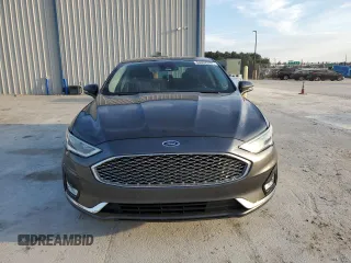 2019 Ford Fusion Hybrid Titanium with VIN 3FA6P0RU9KR116785, listed as a Copart auction lot 68052202 with 89,486 mi miles. Bid and sale history available at carsss.com. Image 5.