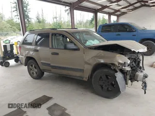 2005 Jeep Grand Cherokee Laredo with VIN 1J4GR48KX5C589625, listed as a IAAI auction lot 42699102 with Not provided miles and . Bid and sale history available at DreamBid. Image 14.