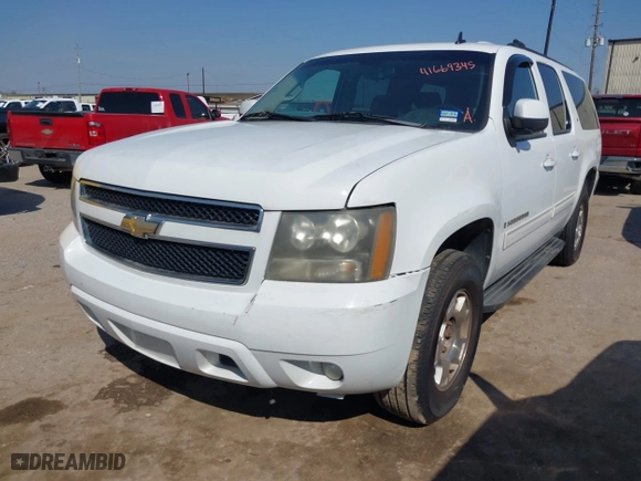 2009 Chevrolet Suburban LT w/2LT with VIN 1GNFC26089R273028, listed as a IAAI auction lot 41669345 with 244,869 mi miles. Bid and sale history available at carsss.com. Image 2.