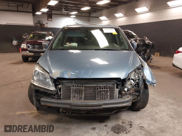 2007 Honda Odyssey EX-L with VIN 5FNRL38687B102568, listed as a IAAI auction lot 41991054 with 243,896 mi miles. Bid and sale history available at carsss.com. Image 12.