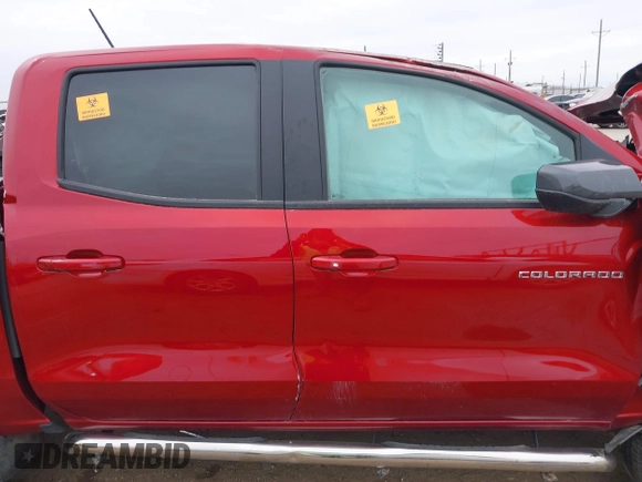 2023 Chevrolet Colorado 2WD LT z VIN 1GCPSCEK7P1269024, wystawiony jako IAAI lot #41788940 z przebiegiem Nie podano mil oraz . Historia ofert i sprzedaży dostępna na DreamBid. Obrazek 14.