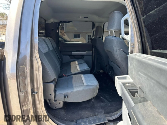 2023 Ford F-150 XL with VIN 1FTEW1EP1PFA41180, listed as a Copart auction lot 53303335 with 11,220 mi miles and Salvage Title. Bid and sale history available at carsss.com. Image 9.