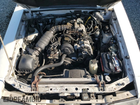 1993 Ford Mustang z VIN 1FACP44M9PF187992, wystawiony jako Copart lot #68557154 z przebiegiem 63 008 mil mil oraz Czysty tytuł • Clean title. Historia ofert i sprzedaży dostępna na DreamBid. Obrazek 11.