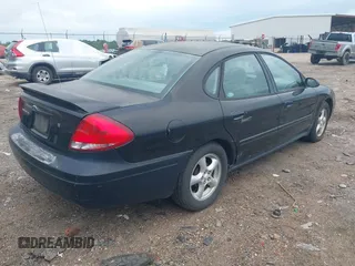 2004 Ford Taurus SE with VIN 1FAFP53U34A107793, listed as a IAAI auction lot 42190553 with 195,459 mi miles and . Bid and sale history available at DreamBid. Image 4.