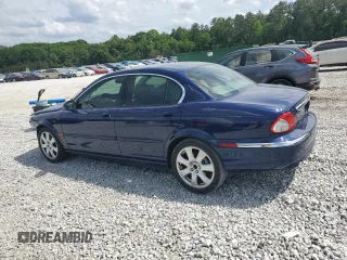 2004 Jaguar X-Type with VIN SAJEA51C44WD83361, listed as a Copart auction lot 55643545 with 54,615 mi miles and Salvage Title. Bid and sale history available at DreamBid. Image 2.