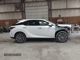 2024 Lexus RX 350h with VIN 2T2BBMCA6RC039544, listed as a IAAI auction lot 42224785 with 9,952 mi miles and . Bid and sale history available at DreamBid. Image 14.
