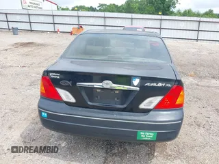 2001 Toyota Avalon XL z VIN 4T1BF28B61U191292, wystawiony jako IAAI lot #42239698 z przebiegiem 288 073 mil mil oraz . Historia ofert i sprzedaży dostępna na DreamBid. Obrazek 13.