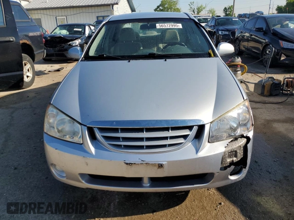 2006 Kia Spectra EX z VIN KNAFE121565370909, wystawiony jako Copart lot #56572995 z przebiegiem 102 978 mil mil oraz Szkoda całkowita • Salvage title. Historia ofert i sprzedaży dostępna na DreamBid. Obrazek 5.