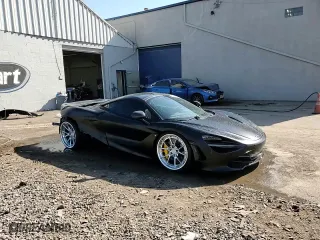 2018 McLaren 720S with VIN SBM14DCA9JW001142, listed as a Copart auction lot 76969554 with 0 mi miles and Salvage Title. Bid and sale history available at carsss.com. Image 14.