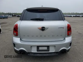 2015 MINI Countryman S z VIN WMWZC3C58FWT06471, wystawiony jako Copart lot #57570585 z przebiegiem 101 963 mil mil oraz Tytuł czysty. Historia ofert i sprzedaży dostępna na DreamBid. Obrazek 6.