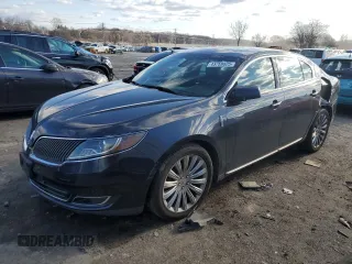 2014 Lincoln MKS with VIN 1LNHL9EK1EG612260, listed as a Copart auction lot 43759825 with 89,746 mi miles and Salvage Title. Bid and sale history available at carsss.com. Image 1.