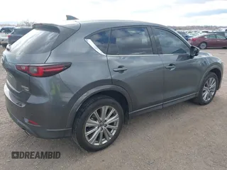 2023 Mazda CX-5 Signature with VIN JM3KFBXY9P0102087, listed as a IAAI auction lot 41771949 with 35,610 mi miles and . Bid and sale history available at carsss.com. Image 4.