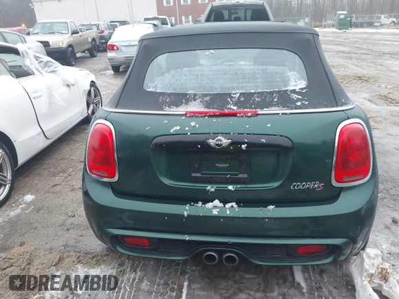 2017 MINI Convertible Cooper S z VIN WMWWG9C38H3C81071, wystawiony jako IAAI lot #41522738 z przebiegiem 59 040 mil mil oraz . Historia ofert i sprzedaży dostępna na DreamBid. Obrazek 16.