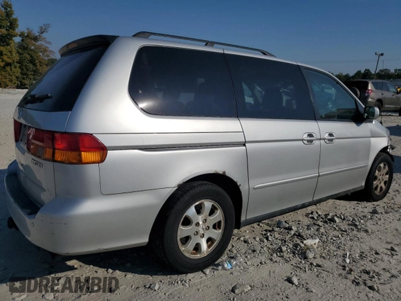 2003 Honda Odyssey EX z VIN 5FNRL18673B014271, wystawiony jako Copart lot #68613374 z przebiegiem 236 360 mil mil oraz Nie do naprawy • Non repairable. Historia ofert i sprzedaży dostępna na DreamBid. Obrazek 3.
