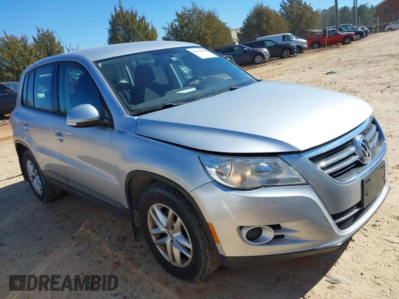 2011 Volkswagen Tiguan SE with VIN WVGBV7AX5BW549090, listed as a IAAI auction lot 41550983 with 153,739 mi miles and . Bid and sale history available at DreamBid. Image 1.