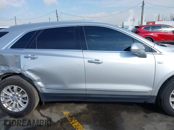 2017 Cadillac XT5 FWD with VIN 1GYKNARS7HZ144148, listed as a IAAI auction lot 41392399 with 96,252 mi miles and . Bid and sale history available at carsss.com. Image 13.