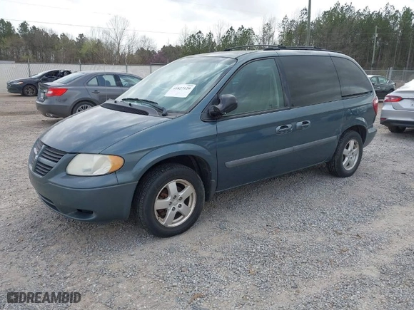2005 Dodge Caravan SXT with VIN 1D4GP45R15B230816, listed as a IAAI auction lot 41827129 with 143,116 mi miles. Bid and sale history available at carsss.com. Image 2.