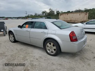 2006 Chrysler 300 C with VIN 2C3KK63H86H345499, listed as a Copart auction lot 87610725 with 171,589 mi miles and Salvage Title. Bid and sale history available at carsss.com. Image 2.