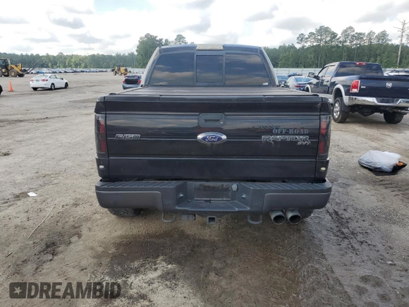 2014 Ford F-150 SVT Raptor with VIN 1FTFW1R60EFB24554, listed as a Copart auction lot 60259144 with 181,027 mi miles and Salvage Title. Bid and sale history available at carsss.com. Image 6.