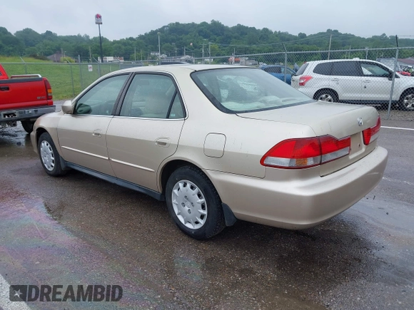 2002 Honda Accord LX z VIN JHMCG56402C025464, wystawiony jako IAAI lot #42458693 z przebiegiem 257 711 mil mil oraz . Historia ofert i sprzedaży dostępna na DreamBid. Obrazek 3.