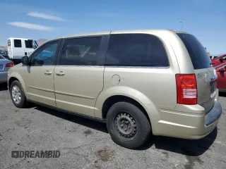 2010 Chrysler Town & Country LX with VIN 2A4RR4DE0AR188949, listed as a Copart auction lot 54140515 with 185,534 mi miles and Salvage Title. Bid and sale history available at DreamBid. Image 2.