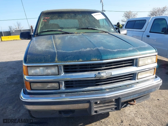 1997 Chevrolet Tahoe with VIN 1GNEK13RXVJ375189, listed as a IAAI auction lot 41959601 with 153,589 mi miles. Bid and sale history available at carsss.com. Image 6.