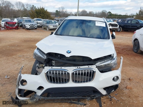 2018 BMW X1 sDrive28i with VIN WBXHU7C37J5H39401, listed as a IAAI auction lot 41421610 with 94,576 mi miles. Bid and sale history available at carsss.com. Image 12.