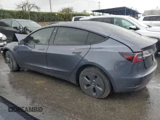 2023 Tesla Model 3 with VIN 5YJ3E1EA2PF639868, listed as a Copart auction lot 49247765 with 19,215 mi miles and Salvage Title. Bid and sale history available at carsss.com. Image 2.